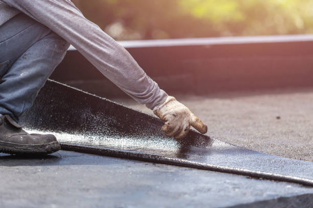 Professional Waterproofing technician working in Floral Park, NY